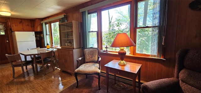 198 Eldred Yulan Rd, Call Listing Agent, NY 12732 - living area with wooden walls, wood finished floors, and a baseboard heating unit