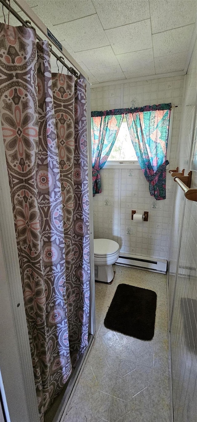 198 Eldred Yulan Rd, Call Listing Agent, NY 12732 - full bathroom featuring a baseboard radiator, toilet, and a shower with shower curtain