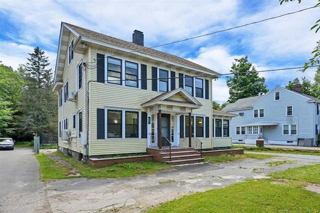 541 Broadway, Monticello, NY 12701 - view of front of home with a chimney