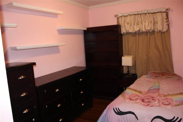2 Burnett Ave, Bay Shore, NY 11706 - bedroom featuring ornamental molding and dark wood finished floors