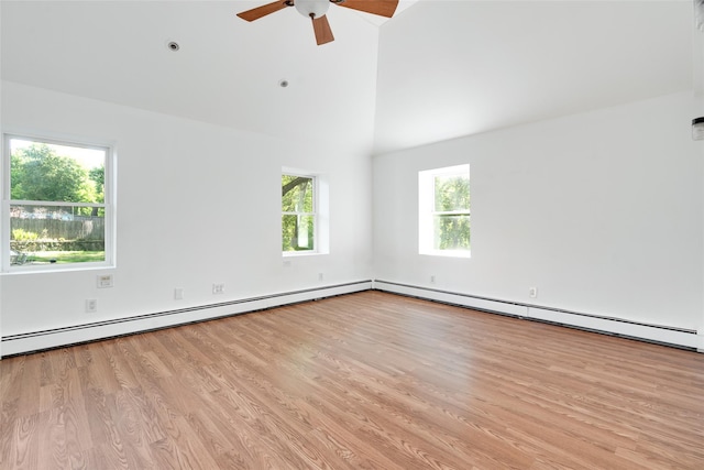 spare room with wood finished floors, ceiling fan, and high vaulted ceiling