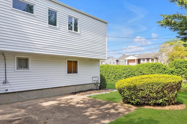 1692 N Gate, Merrick, NY 11566 - view of side of home with a yard