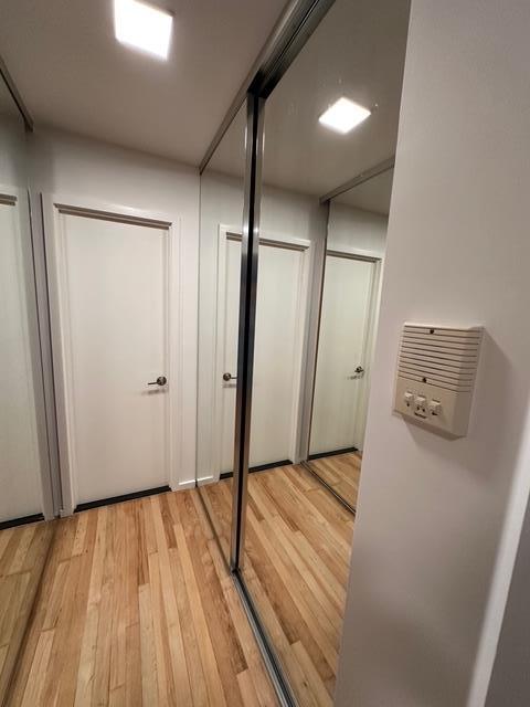 hall featuring light wood-style floors
