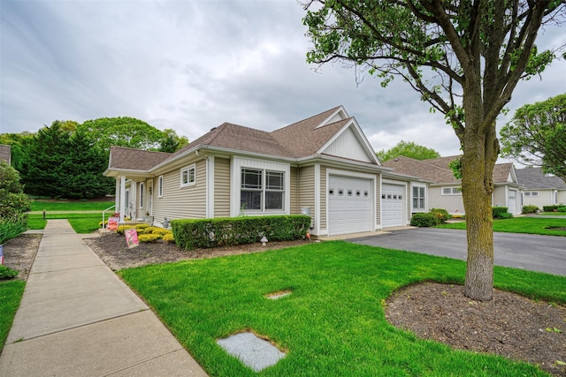 7 White Oak Ct Unit 7, Coram, NY 11727 - view of front of property featuring an attached garage, asphalt driveway, and a front lawn
