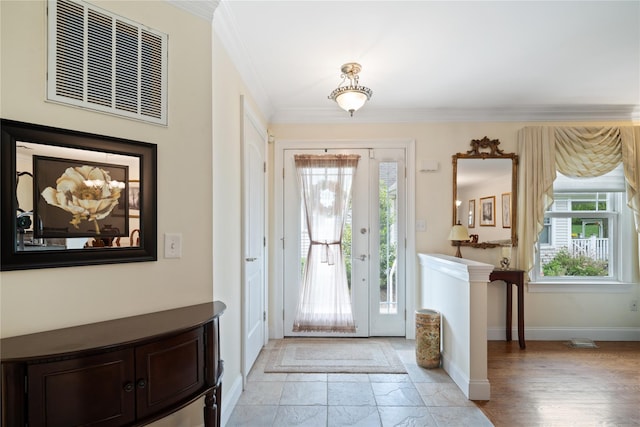 7 White Oak Ct Unit 7, Coram, NY 11727 - foyer featuring baseboards and ornamental molding