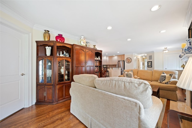 7 White Oak Ct Unit 7, Coram, NY 11727 - living area with recessed lighting, ornamental molding, and light wood finished floors