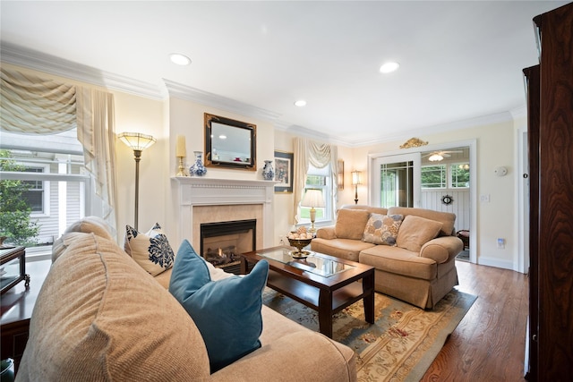 7 White Oak Ct Unit 7, Coram, NY 11727 - living area with a tiled fireplace, ornamental molding, recessed lighting, wood finished floors, and baseboards