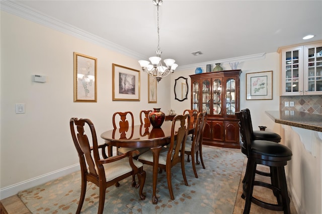 7 White Oak Ct Unit 7, Coram, NY 11727 - dining area with a chandelier, ornamental molding, and baseboards