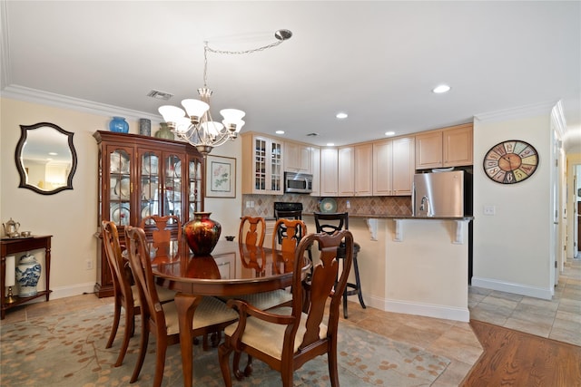7 White Oak Ct Unit 7, Coram, NY 11727 - dining area featuring a chandelier, ornamental molding, recessed lighting, baseboards, and light tile patterned floors
