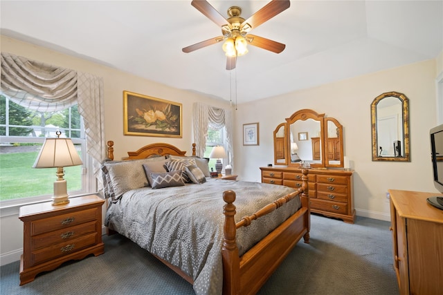 7 White Oak Ct Unit 7, Coram, NY 11727 - bedroom featuring dark carpet, multiple windows, baseboards, and ceiling fan