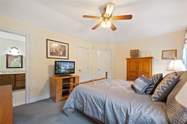 7 White Oak Ct Unit 7, Coram, NY 11727 - carpeted bedroom featuring connected bathroom, a ceiling fan, and baseboards