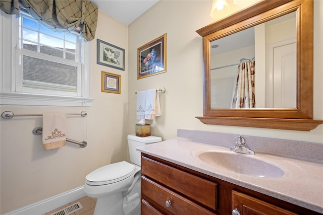 7 White Oak Ct Unit 7, Coram, NY 11727 - full bath featuring baseboards, vanity, toilet, tile patterned floors, and a shower with curtain