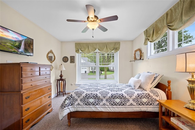 7 White Oak Ct Unit 7, Coram, NY 11727 - bedroom featuring carpet, baseboards, and ceiling fan
