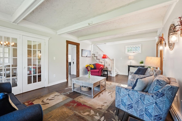 living room with stairs, beamed ceiling, wood finished floors, baseboards, and a baseboard radiator