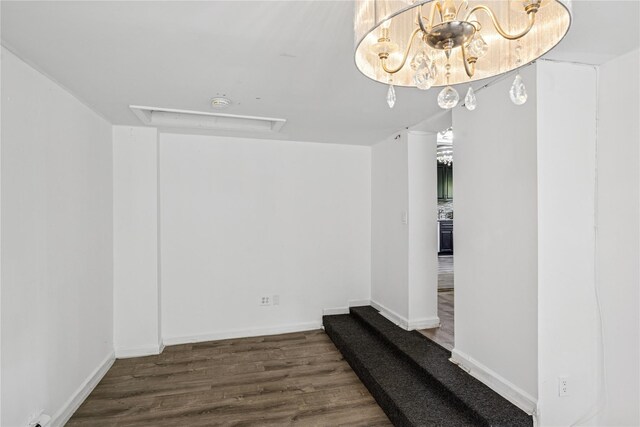 54 Oakdale Ave, Selden, NY 11784 - spare room featuring wood finished floors and baseboards