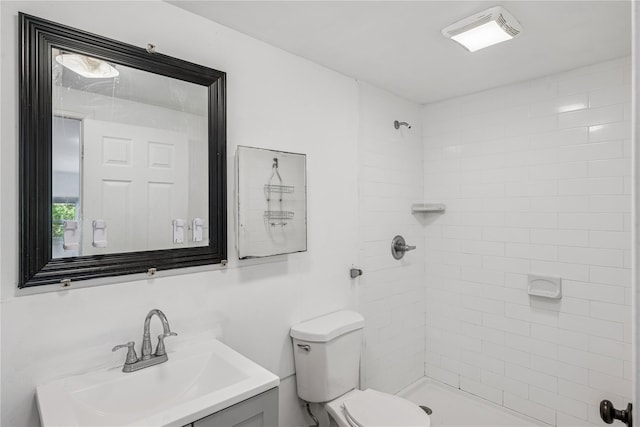 54 Oakdale Ave, Selden, NY 11784 - full bathroom with toilet, vanity, and a tile shower
