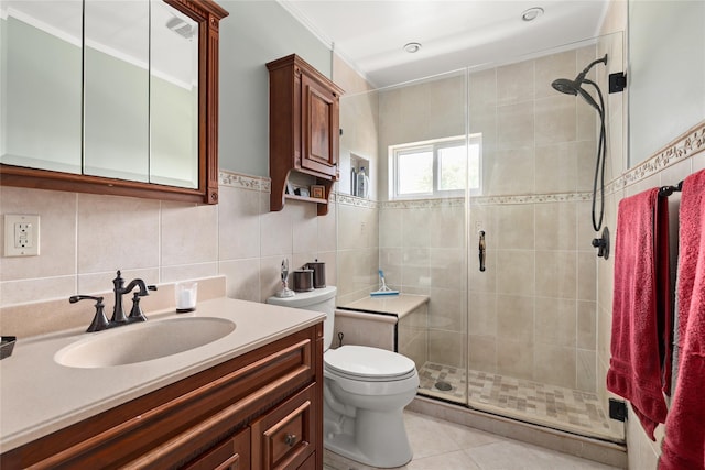 full bath with a shower stall, toilet, vanity, tile walls, and tasteful backsplash