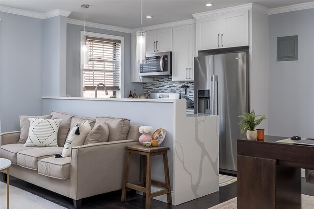 living area with ornamental molding, recessed lighting, electric panel, and dark wood-style floors