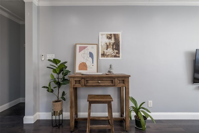detailed view of ornamental molding, baseboards, and wood finished floors