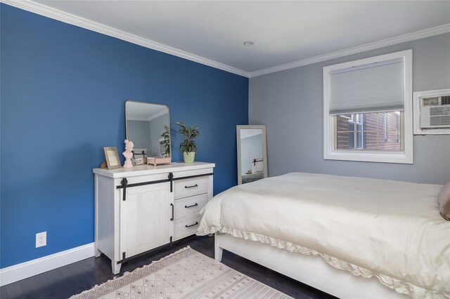 bedroom featuring baseboards, crown molding, and dark wood-type flooring
