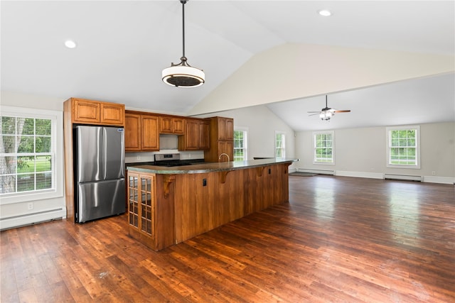 5105-5103 Rte 82, Salt Point, NY 12578 - kitchen featuring appliances with stainless steel finishes, a baseboard heating unit, dark wood-style floors, dark countertops, and vaulted ceiling