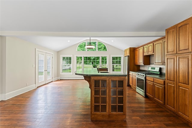 5105-5103 Rte 82, Salt Point, NY 12578 - kitchen featuring stainless steel range with gas stovetop, dark countertops, vaulted ceiling, a sink, and dark wood-style floors