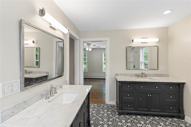 5105-5103 Rte 82, Salt Point, NY 12578 - bathroom featuring two vanities, baseboard heating, a ceiling fan, and recessed lighting