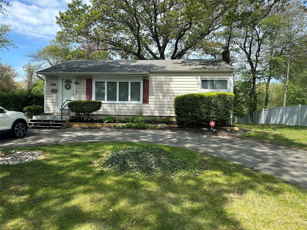 view of front of property featuring a chimney