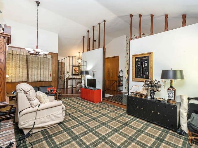 36 Lisa Dr, Dix Hills, NY 11746 - living area featuring high vaulted ceiling and a chandelier