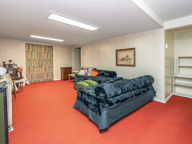 36 Lisa Dr, Dix Hills, NY 11746 - living room featuring carpet floors and wood walls