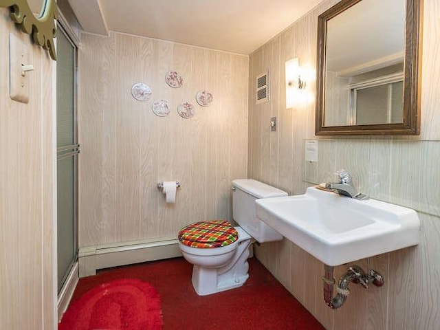 36 Lisa Dr, Dix Hills, NY 11746 - bathroom with a baseboard radiator, toilet, and a shower with shower door