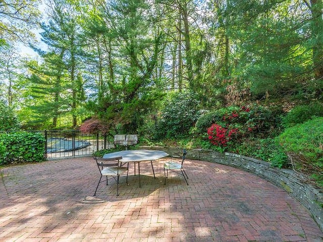 36 Lisa Dr, Dix Hills, NY 11746 - view of patio / terrace with outdoor dining space and fence
