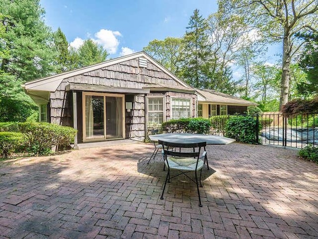 36 Lisa Dr, Dix Hills, NY 11746 - view of patio featuring fence and outdoor dining area