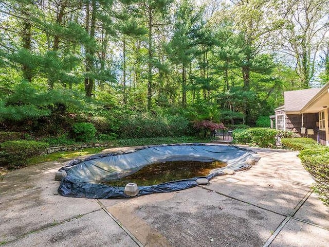 36 Lisa Dr, Dix Hills, NY 11746 - view of swimming pool featuring a covered pool