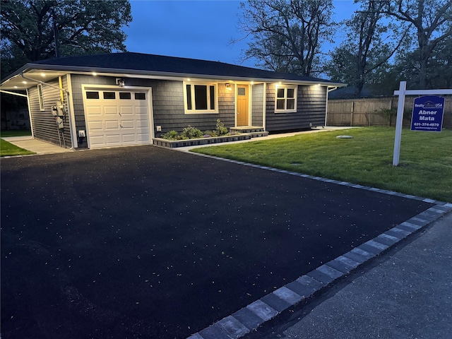 9 Henry St, Wyandanch, NY 11798 - single story home featuring a garage and asphalt driveway