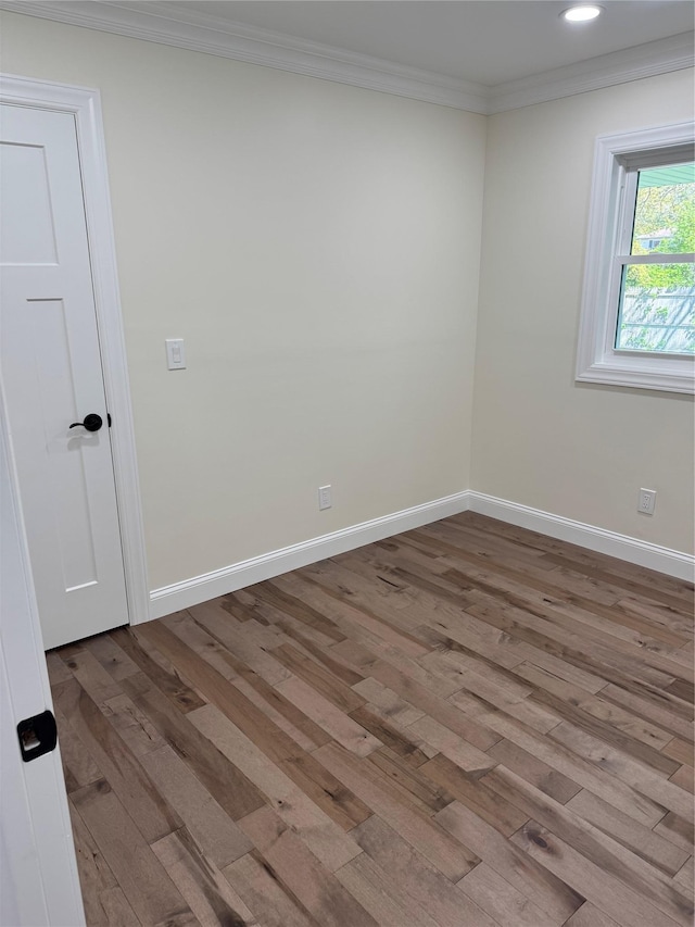 9 Henry St, Wyandanch, NY 11798 - spare room with wood finished floors, crown molding, baseboards, and recessed lighting