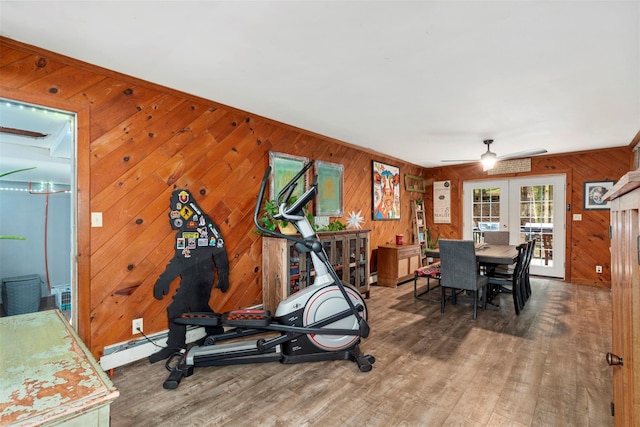 45 Proctor Rd, Eldred, NY 12732 - exercise area with french doors, wood finished floors, wooden walls, and a ceiling fan