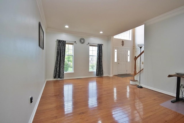 622 Creekside Ln, Fishkill, NY 12524 - entryway with ornamental molding, wood-type flooring, baseboards, stairs, and recessed lighting