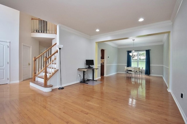 622 Creekside Ln, Fishkill, NY 12524 - unfurnished room featuring light wood-style floors, stairs, a chandelier, baseboards, and ornamental molding