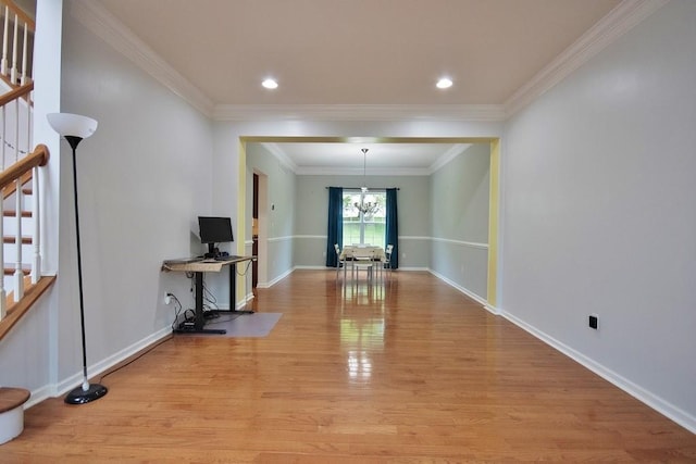 622 Creekside Ln, Fishkill, NY 12524 - spare room with stairway, light wood-style flooring, a chandelier, ornamental molding, and baseboards