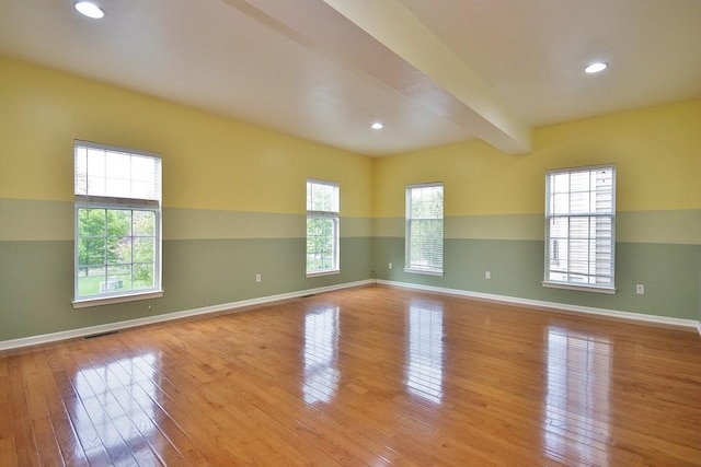 622 Creekside Ln, Fishkill, NY 12524 - unfurnished room with hardwood / wood-style floors, recessed lighting, beamed ceiling, and baseboards