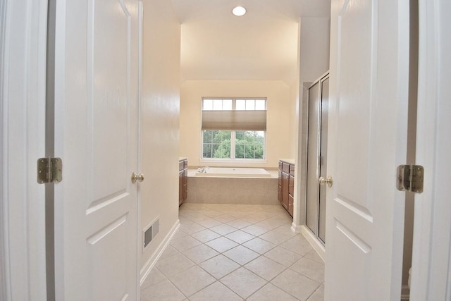 622 Creekside Ln, Fishkill, NY 12524 - bathroom with a stall shower, tile patterned flooring, and a garden tub