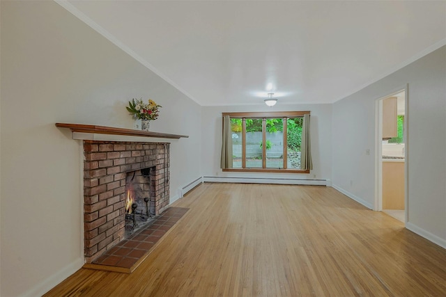 155 Woodbury Rd, Huntington, NY 11743 - unfurnished living room with a tile fireplace, wood finished floors, crown molding, baseboards, and baseboard heating