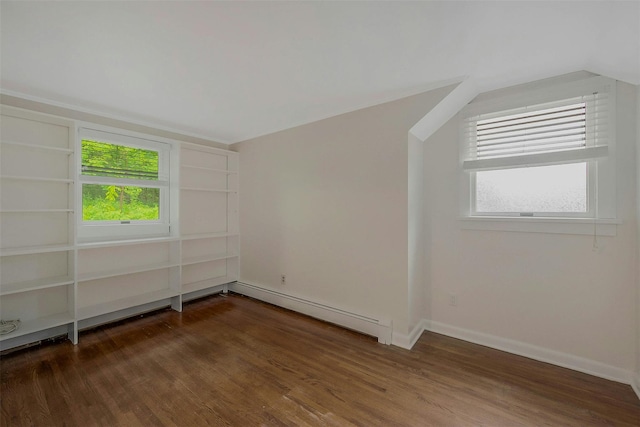 155 Woodbury Rd, Huntington, NY 11743 - bonus room with a baseboard heating unit, wood finished floors, baseboards, and lofted ceiling