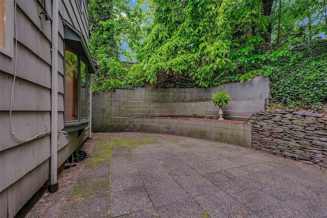 155 Woodbury Rd, Huntington, NY 11743 - view of patio featuring fence