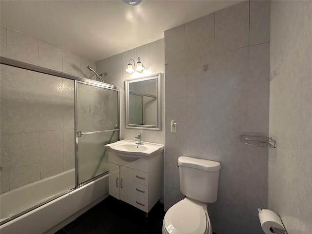 7177 159th St Unit 205, Flushing, NY 11365 - bathroom with toilet, shower / bath combination with glass door, and vanity