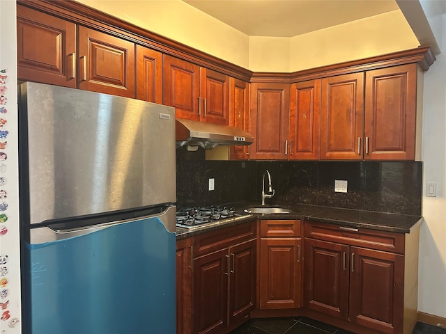 7177 159th St Unit 205, Flushing, NY 11365 - kitchen featuring stainless steel appliances, ventilation hood, a sink, backsplash, and dark tile patterned flooring