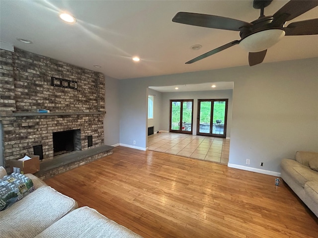 1433 Rte 208, Washingtonville, NY 10992 - living area with a brick fireplace, wood finished floors, baseboards, and recessed lighting