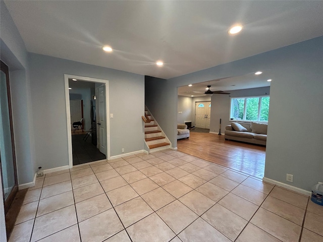 1433 Rte 208, Washingtonville, NY 10992 - unfurnished living room featuring stairway, light tile patterned floors, a ceiling fan, recessed lighting, and baseboards