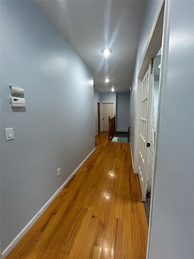 1433 Rte 208, Washingtonville, NY 10992 - hall featuring baseboards, light wood-style floors, and an upstairs landing